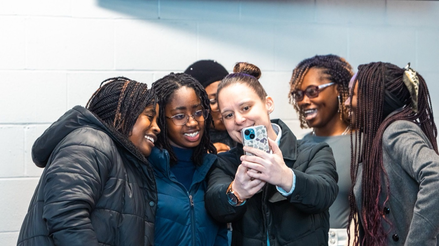 Friends from church taking a selfie together after service